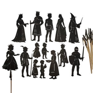 May include: A set of 12 black silhouette figures of a king, queen, wizard, knight, and other fairytale characters. The figures are made of cardboard and are designed for use in shadow puppet shows.