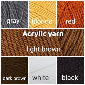 May include: A collection of acrylic yarn in various colors, including gray, blonde, red, light brown, dark brown, white, and black.  Acrylic yarn.