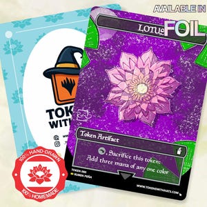 May include: A rectangular game card featuring a purple background with a pink lotus flower illustration, labeled Token Artifact with text reading Sacrifice this token: Add three mana of any one color. A secondary card shows a witch hat logo.