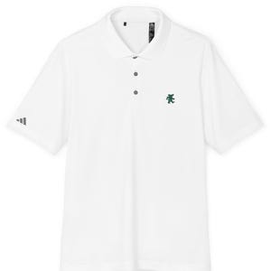 May include: White polo shirt with short sleeves. Features a collared neckline, three buttons, and a small green graphic on the chest. The Adidas logo is visible on the left sleeve. A classic golf or athletic shirt.