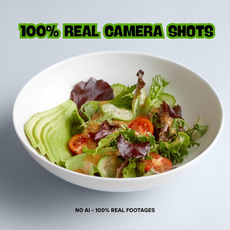 Pode incluir: Uma tigela branca cheia de uma salada fresca, incluindo abacate fatiado, tomates cereja e verduras mistas. A salada &eacute; temperada com um molho vinagrete leve. O texto no topo diz "100% REAL CAMERA SHOTS" e na parte inferior "NO AI - 100% REAL FOOTAGES".