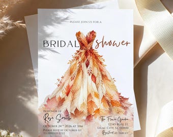 May include: A white bridal shower invitation card featuring a watercolor illustration of a dress made from autumn leaves in shades of orange, red, and yellow. The text reads: PLEASE JOIN US FOR A BRIDAL shower, IN HONOR OF Rose Smith, OCTOBER 24TH 2026 at 3PM, PLEASE RSVP BY OCTOBER 1ST TO (000)111-2222, The Flower Garden, 12345 ROSE ST. LILAC CITY, ST. 00000, Registered AT TARGET.
