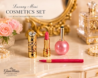 May include: A 1:12 scale dollhouse miniature cosmetics set featuring a gold lipstick tube with a crystal top, an open pink lipstick, a round pink bottle with a gold cap, and a pink pencil. Text reads Luxury Mini COSMETICS SET and Glam Minis.