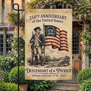May include: A garden flag with a vintage illustration celebrating the 250th anniversary of the United States. The design includes a colonial soldier, the American flag, and the text "DESCENDANT of a PATRIOT". The flag is displayed outdoors.