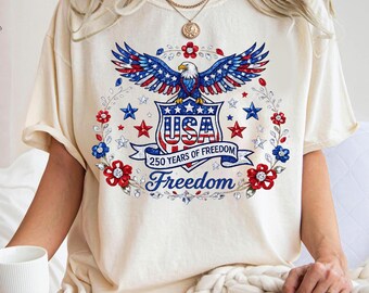 アメリカ建国250周年記念ラインストーン風シャツ、愛国的なイーグル柄花柄Tシャツ、アメリカ建国250周年記念グリッターフラッグTシャツ
