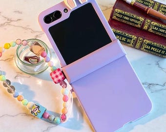 紫色のうさぎ耳型スマホケース（Galaxy Z Flip 5/6用、ビーズブレスレットヒンジ付き）