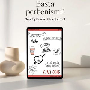 May include: A tablet screen displaying a digital sticker sheet with black and white hand-drawn illustrations and Italian text including "ANSIA", "hate", "V.V.B", "MAI", "TI ODIO", "NO", and "CIAO CORE" with a pink coffee cup icon.