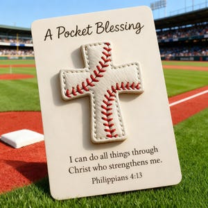 May include: A Pocket Blessing card featuring a baseball-stitched cross. The card includes the text "I can do all things through Christ who strengthens me. Philippians 4:13." The card is set against a baseball field background.