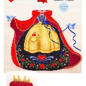 Könnte beinhalten: Ein Kreuzstichmuster mit Schneewittchen aus der "Dress Up Collection". Das Design zeigt Schneewittchens Kleid, Umhang und Krone mit floralen und Herzmotiven. Der Text lautet "Snow White" und "Cross Stitch Chart."