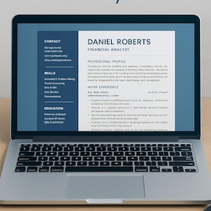 May include: A laptop displays a UK CV template, ATS-Friendly Resume, for a Financial Analyst. The screen shows a resume with contact details, skills, work experience, and education. The text "Editable Word File Financial Analyst CV" is at the bottom.