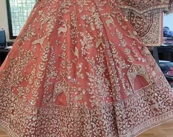 Peach Lengha Choli For Women: Embroidered Party Wear Indian Soft Net Lehenga Choli