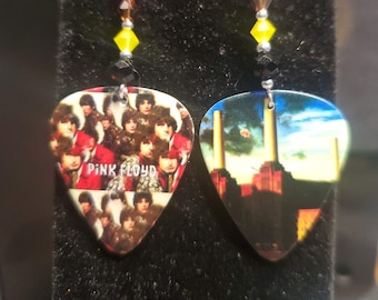 Repurposed Pink Floyd guitar pick earrings.