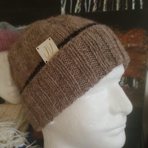 Men&#39;s hand knitted winter hat. Brown
