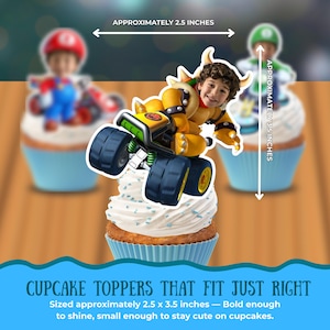 May include: Cupcake toppers featuring a Bowser character on a kart, approximately 2.5 x 3.5 inches. The toppers are placed on cupcakes with white frosting and blue cupcake liners. The image includes other blurred cupcake toppers.