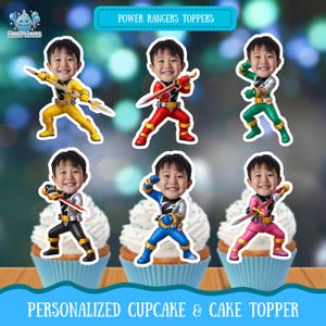 May include: Six personalized cupcake toppers featuring a child's face on Power Rangers bodies in yellow, red, green, black, blue, and pink suits. Each figure holds a weapon and is displayed above a cupcake. The text reads POWER RANGERS TOPPERS.
