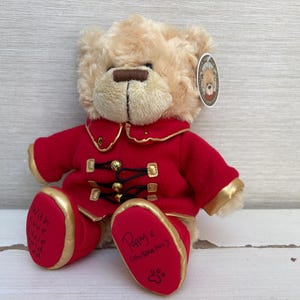 Orsetto di peluche Little Gold Ted firmato dall'illustratrice Poppy, morbido peluche da 25 cm con etichette.