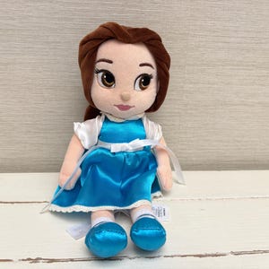 blue dress belle doll Beauty she takes his place to set him free and finds herself in the midst of a mysterious enchantment unlike anything she could ever have imagined Blue Dress Mini Belle Doll