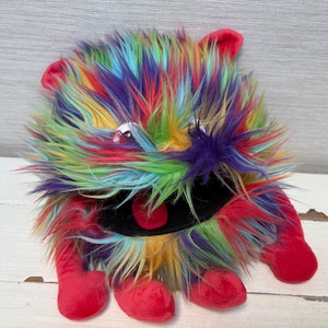 The Puppet Company Baby Monster Rainbow Hand Puppet