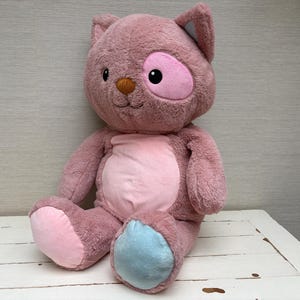 Giant Pink Cat Plush Toy 80cm – Large Mauve Kitten Stuffed Animal with Mismatched Blue/Pink Ears and Eye Patch (Smyths Toys)