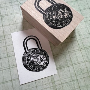 May include: A black and white illustration of a combination padlock with a dial numbered 0 to 44. The padlock is on a wooden block.