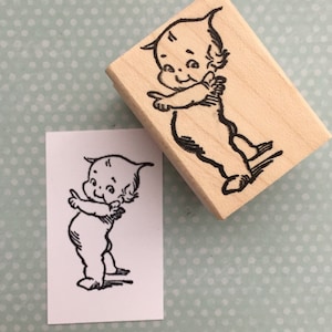 Tiny Pointing Kewpie Doll Mounted Rubber Stamp738 image 1