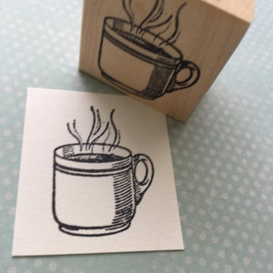 Humeante taza de café montado sello 3698