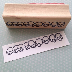 Rij van schedels Rubberstempel 4547