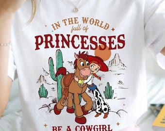 Toy Story Jessie Bullseye Cowgirl PNG, Camiseta Be A Cowgirl, Camiseta del Oeste de Disney, Camiseta Disneyland Girl Trip, Camiseta linda de Pixar