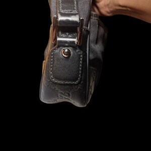 Authentic Gucci black guccissima clutch wristlet with leather strap GG monogram iconic design great condition very clean bild 5