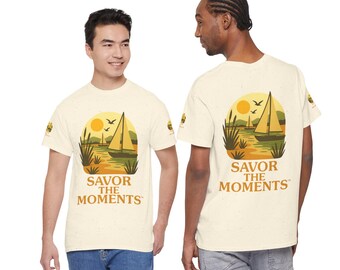Sailboat Sunset Savor the Moments T‑Shirt with coastal vibe, sunlit bay, soaring birds, and sailing graphic tee design for ocean lovers.