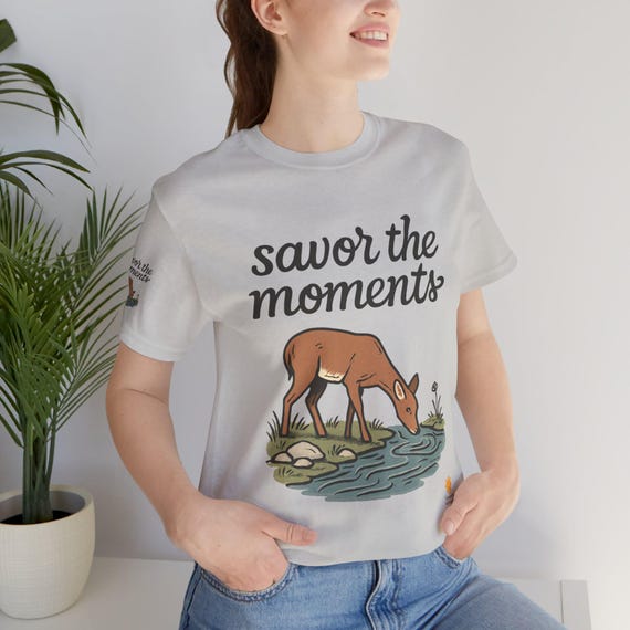 Deer Tee with wildlife graphic, peaceful stream, woodland nature vibe, and Savor the Moments™ design, gift for birthday or holiday.