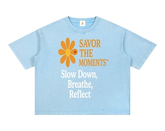 Wellness‑vibe Mineral Wash Boxy Tee, soft orange daisies, Savor the Moments design, calm living, nature‑inspired style.
