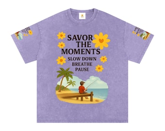 Coastal vibe snow-washed oversized, palm trees, ocean fishing scene, boy on pier artwork, uplifting “Savor the moments” message.