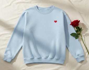 Sudadera con corazón bordado, cuello redondo de algodón minimalista, jersey básico para el día a día.