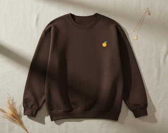 Sudadera bordada con fruta naranja, jersey minimalista de algodón con cuello redondo.