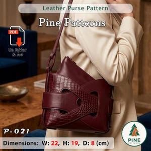 May include: A burgundy leather purse with a crocodile-textured flap and a shoulder strap. The purse has a unique design with cut-out details and a rectangular shape. The dimensions are W: 22 cm, H: 19 cm, D: 8 cm. The text "Leather Purse Pattern" and "Pine Patterns" are visible.