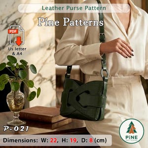 May include: A dark green leather purse with a crocodile texture, held by a person. The purse has a unique design with cut-out details and a buckle closure. The text "Leather Purse Pattern" and "Pine Patterns" are visible. Dimensions: Width 22 cm, Height 19 cm, Depth 8 cm.