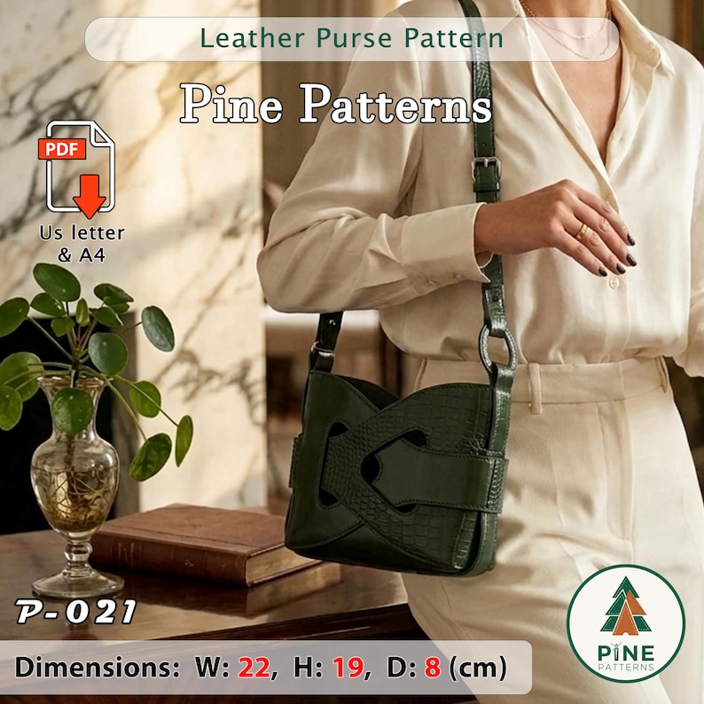 May include: A dark green leather purse with a crocodile texture, held by a person. The purse has a unique design with cut-out details and a buckle closure. The text "Leather Purse Pattern" and "Pine Patterns" are visible. Dimensions: Width 22 cm, Height 19 cm, Depth 8 cm.