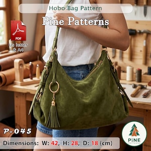 May include: An olive green suede hobo bag featuring a gold-tone zipper closure, side straps with gold rings, and a matching suede tassel charm. The bag measures 42 cm in width, 28 cm in height, and 18 cm in depth. Text includes Hobo Bag Pattern and Pine Patterns.