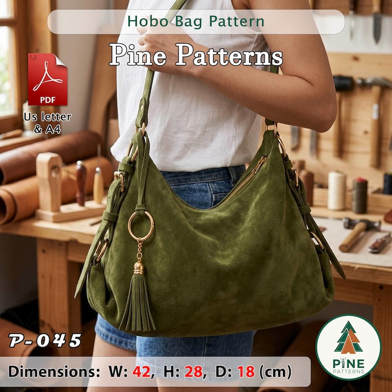 May include: An olive green suede hobo bag featuring a gold-tone zipper closure, side straps with gold rings, and a matching suede tassel charm. The bag measures 42 cm in width, 28 cm in height, and 18 cm in depth. Text includes Hobo Bag Pattern and Pine Patterns.