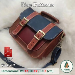 May include: A multi-coloured satchel bag featuring a blue flap, a dark red main body, and brown leather straps with brass-toned buckles. The bag includes a top handle and a detachable shoulder strap. Text reads Pine Patterns and P-067.