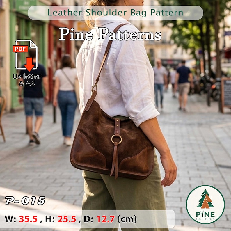 May include: A brown leather shoulder bag with a suede finish, featuring a circular metal accent and a long strap. The bag measures 14 inches wide, 10 inches high, and 5 inches deep. The image includes the text "Leather Shoulder Bag Pattern" and "Pine Patterns".