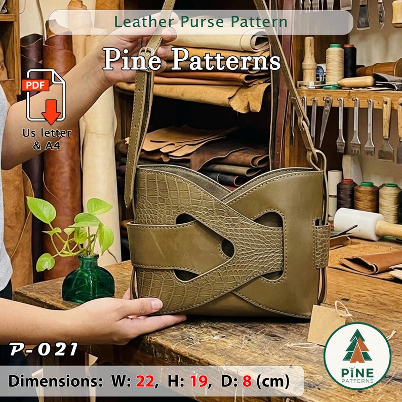 May include: Olive green leather purse with a crocodile-textured accent. The bag has a unique design with a strap and a flap closure. Dimensions are 8.7 inches wide, 7.5 inches high, and 3.1 inches deep. The image includes the text "Leather Purse Pattern" and "Pine Patterns".
