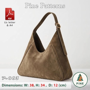 Puede incluir: Un bolso hobo de ante marrón con silueta triangular, una sola correa ajustable con hebilla dorada y base plana. La imagen incluye el texto Pine Patterns, P-083 y las dimensiones de A: 38, Al: 34, P: 12 cm.