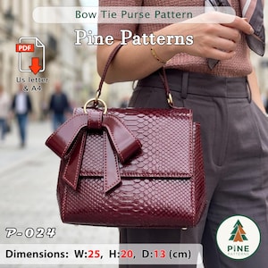 May include: A burgundy bow tie purse with a snakeskin texture. The purse has a matching bow detail and gold-colored hardware. The dimensions are approximately 9.8 inches wide, 7.9 inches high, and 5.1 inches deep. The image includes the text "Bow Tie Purse Pattern" and "Pine Patterns".