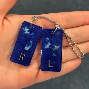 May include: A rustic wooden sign with the text "Welcome to our home" in white lettering. The sign has a distressed finish and a simple, inviting design, ideal for a front porch or entryway.