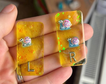 ゲイリー・ザ・スネイル チャーム X線マーカー イエローチャンキーグリッター ハンドメイド（放射線技師用）