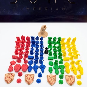 May include: A set of three ceramic mugs with a speckled, matte finish in cream, light grey, and dark grey. Each mug has a simple, minimalist design and a rounded handle.