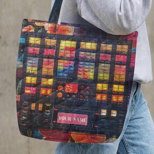 May include: A colorful tote bag with a unique design. The bag features a vibrant, geometric pattern with a variety of colors, including red, yellow, and blue. The bag has a rectangular shape and sturdy handles. The text "YOUR NAME" is visible on the bag.