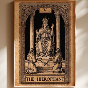 May include: A rectangular wall art print featuring a black and white tarot card illustration titled The Hierophant. The design depicts a central figure wearing a crown and robes, seated between two pillars, with two kneeling figures below.